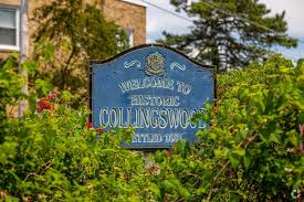 Collingswood Pic – Talia Lerner May contain a dark-blue sign that says "Welcome to Historic Collingswood" and the year "1897".