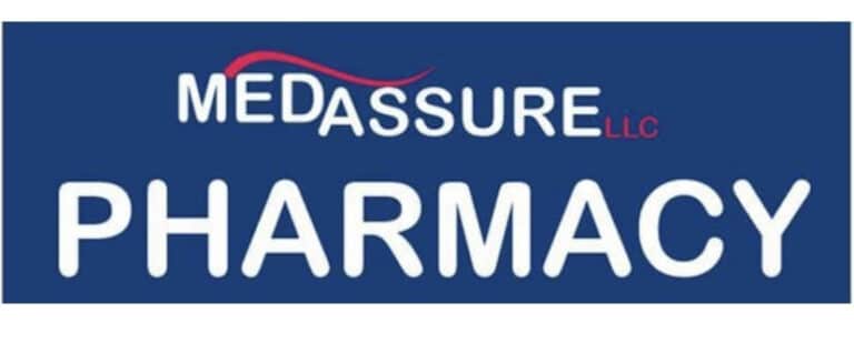 A blue rectangular sign with the words MEDASSURE LLC at the top in white and red, and PHARMACY in large white letters below.